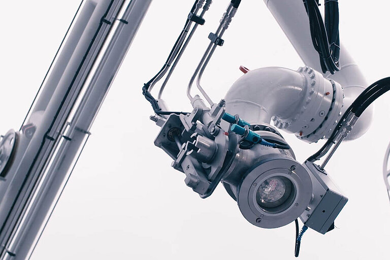 Foto: Gesco: Ein technischer roehrenfoermiger Arm mit einer Linse